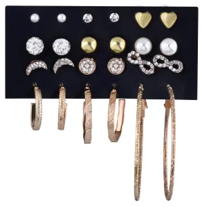 Troli Set vergoldete runde Ohrringe und Ringe mit Zirkonen (12 Paar)